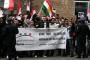 سوريون مناوئون للأسد يتظاهرون أمام سفارة بلادهم في كييف
