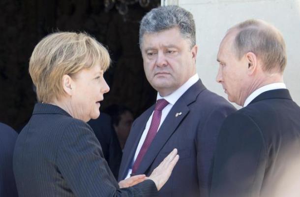 بوروشينكو يلتقي بوتن في فرنسا لمدة 15 دقيقة بوساطة ألمانية