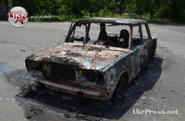 سيارة محترقة قرب مدينة ديرجينسك