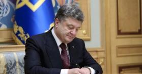 بوروشينكو يصادق على قانون "خدمة الأجانب" في صفوف الجيش الأوكراني